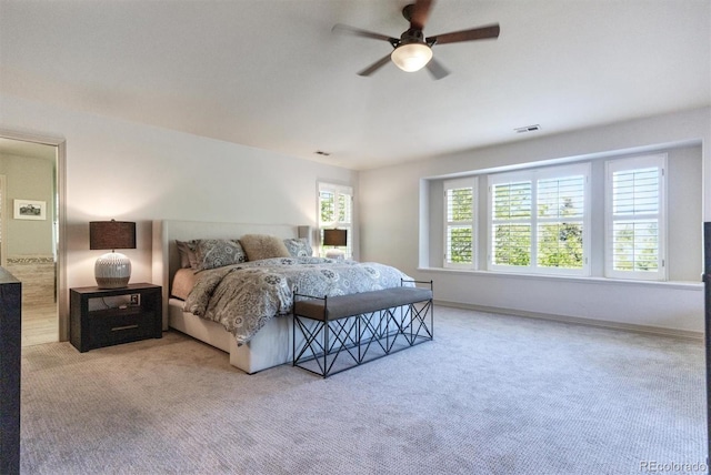 9880 E Progress Cir, Greenwood Village, CO 80111 - carpeted bedroom with baseboards and a ceiling fan