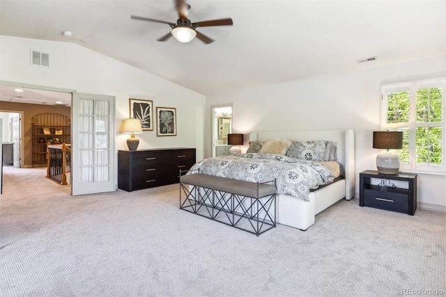 9880 E Progress Cir, Greenwood Village, CO 80111 - bedroom with light colored carpet, vaulted ceiling, and a ceiling fan