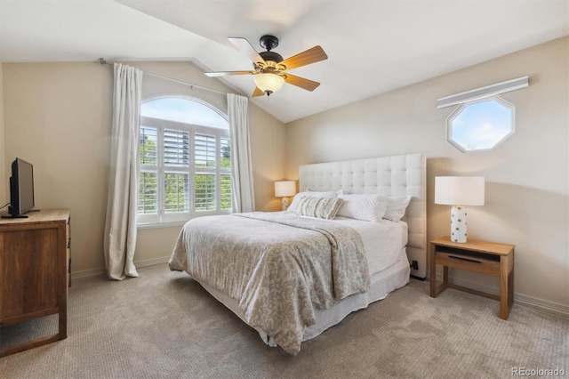 9880 E Progress Cir, Greenwood Village, CO 80111 - bedroom with lofted ceiling, light carpet, baseboards, and ceiling fan