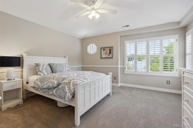 9880 E Progress Cir, Greenwood Village, CO 80111 - carpeted bedroom with ceiling fan and baseboards
