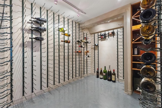 9880 E Progress Cir, Greenwood Village, CO 80111 - wine room with baseboards and concrete flooring