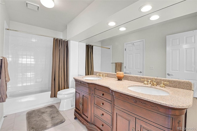 full bath featuring double vanity, toilet, tile patterned floors, shower / bath combination with curtain, and a sink