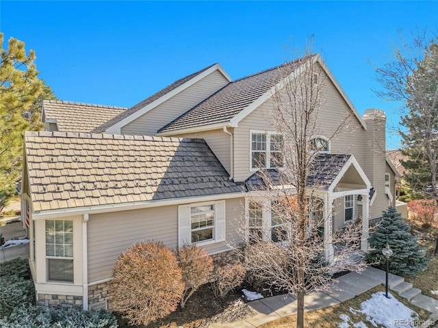 view of property exterior featuring stone siding