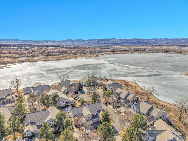 birds eye view of property featuring a mountain view and a residential view