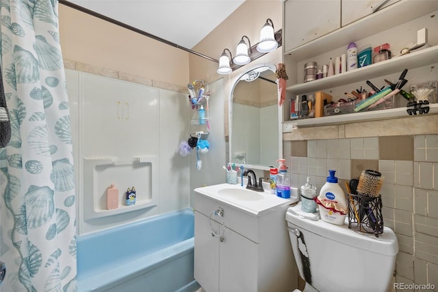 11192 E 7th Ave, Aurora, CO 80010 - bathroom featuring shower / bath combo with shower curtain, vanity, and tile walls