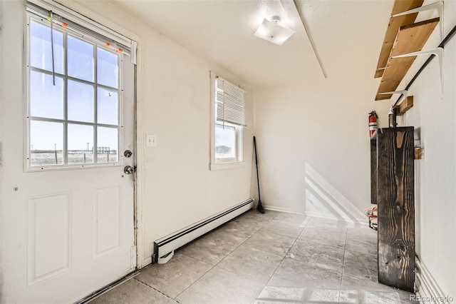 entryway with a baseboard heating unit