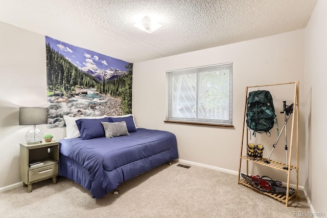 9411 W 89th Cir, Westminster, CO 80021 - bedroom with carpet, a textured ceiling, and baseboards