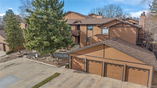 9411 W 89th Cir, Westminster, CO 80021 - view of front of home with concrete driveway and a garage