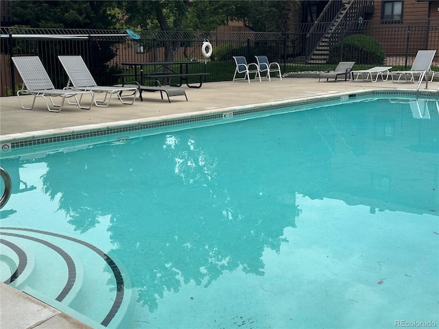 9411 W 89th Cir, Westminster, CO 80021 - community pool featuring a patio area