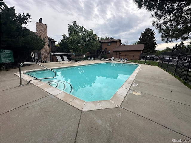 9411 W 89th Cir, Westminster, CO 80021 - community pool featuring a patio