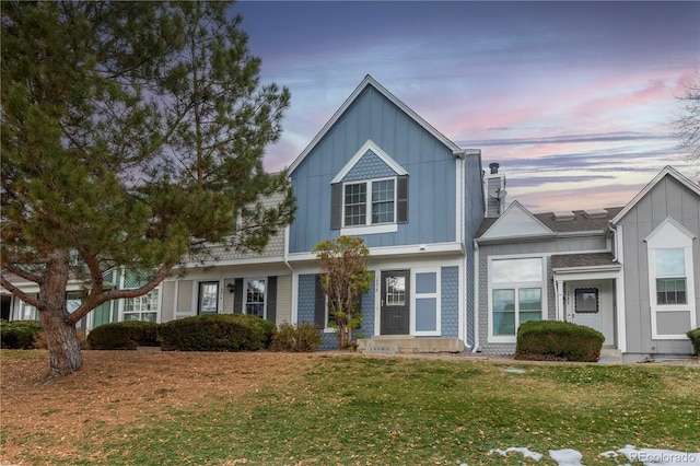 view of front of home featuring a yard