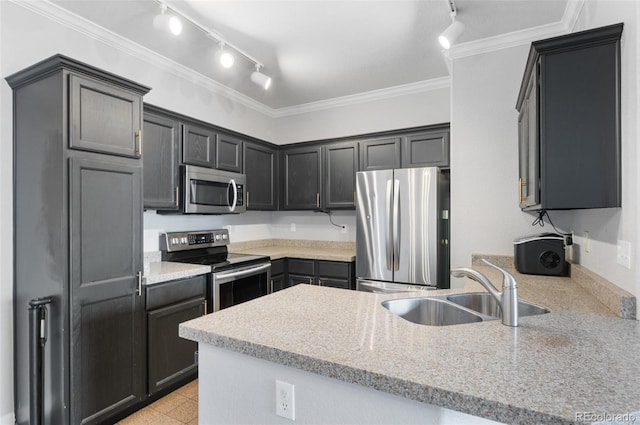 kitchen with light stone countertops, kitchen peninsula, stainless steel appliances, crown molding, and sink