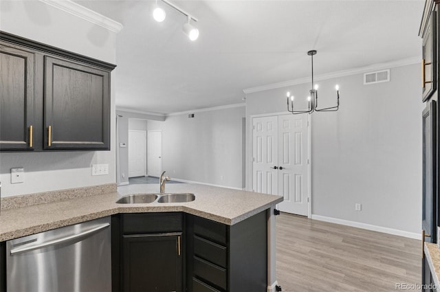 kitchen with crown molding, dishwasher, an inviting chandelier, and sink