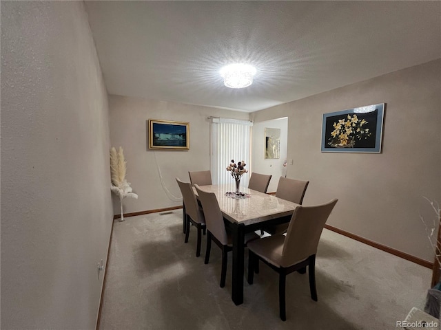 view of carpeted dining room