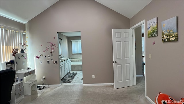 interior space with high vaulted ceiling and sink