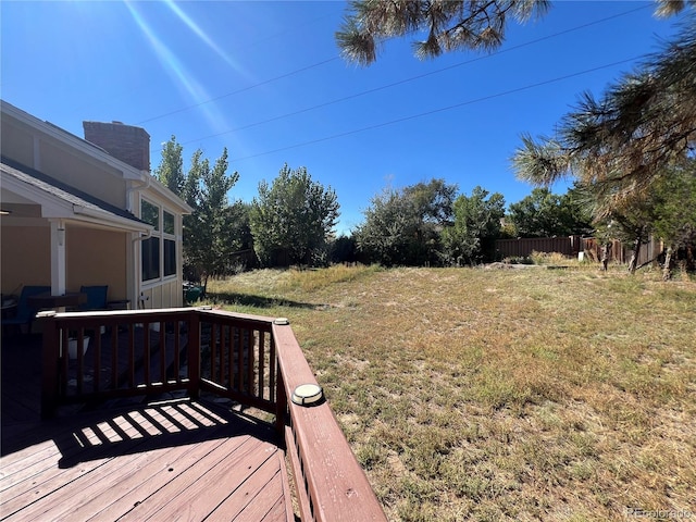 view of yard featuring a wooden deck