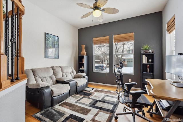 office area featuring ceiling fan and light hardwood / wood-style floors