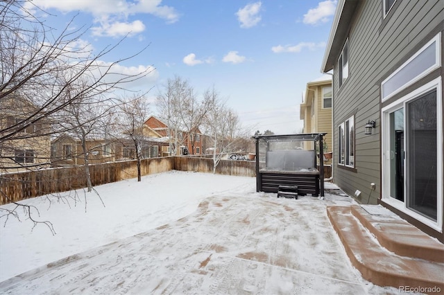 view of yard covered in snow