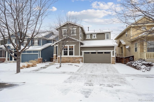 view of front of home with stone siding and an attached garage