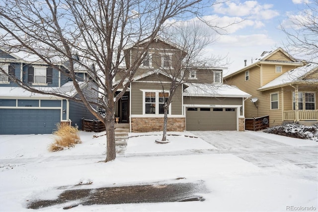 view of front of home featuring an attached garage and stone siding