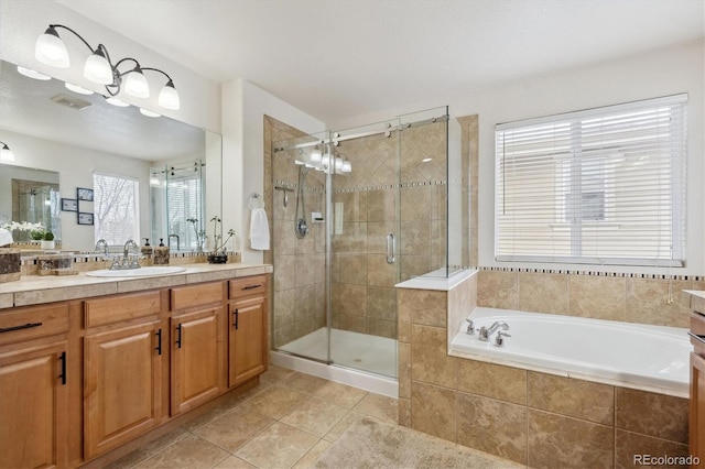 10251 Rifle St, Commerce City, CO 80022 - full bath featuring tile patterned floors, visible vents, a shower stall, a bath, and vanity