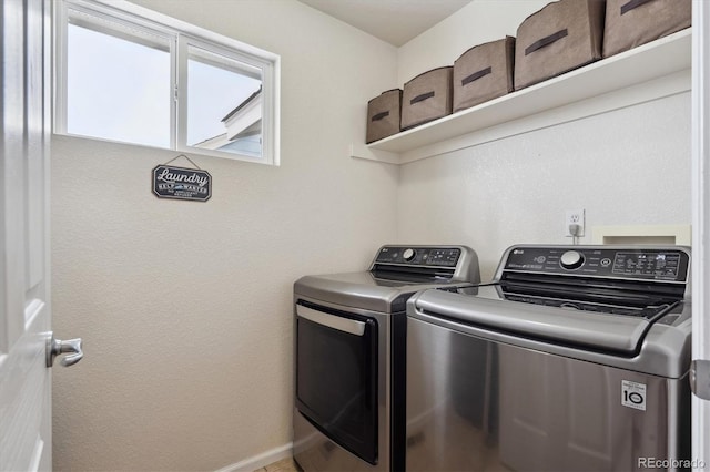 10251 Rifle St, Commerce City, CO 80022 - clothes washing area with laundry area, washing machine and dryer, and baseboards
