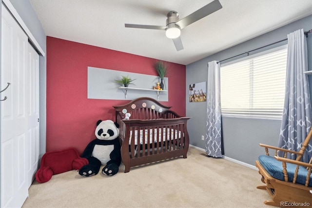10251 Rifle St, Commerce City, CO 80022 - bedroom featuring baseboards, carpet floors, ceiling fan, a nursery area, and a closet