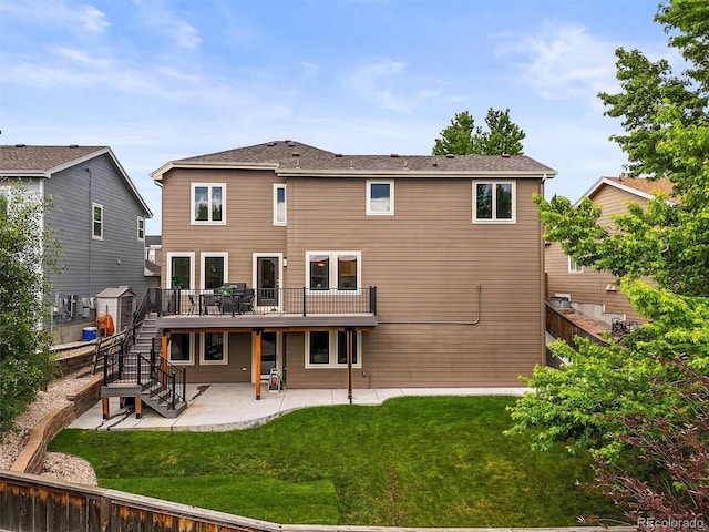 10235 Rustic Redwood Ln, Highlands Ranch, CO 80126 - rear view of property featuring a patio area, stairway, and a deck