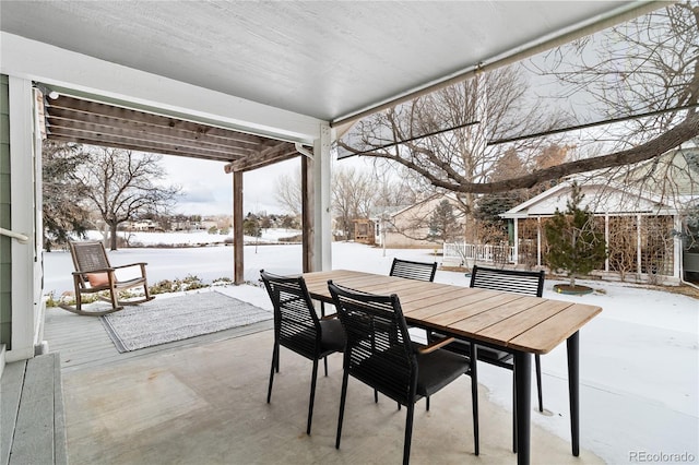 view of snow covered patio