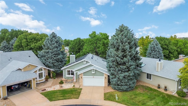 exterior space with a garage and a front yard