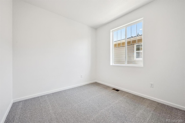 317 W Owen Ave, Keenesburg, CO 80643 - empty room featuring baseboards and carpet floors
