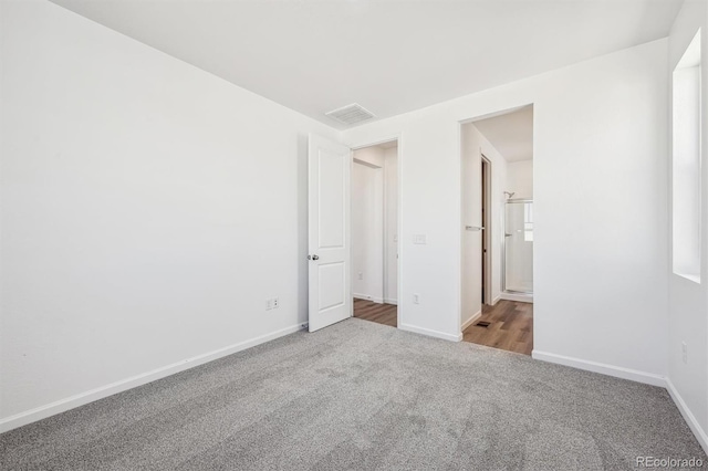 317 W Owen Ave, Keenesburg, CO 80643 - unfurnished bedroom featuring carpet flooring and baseboards