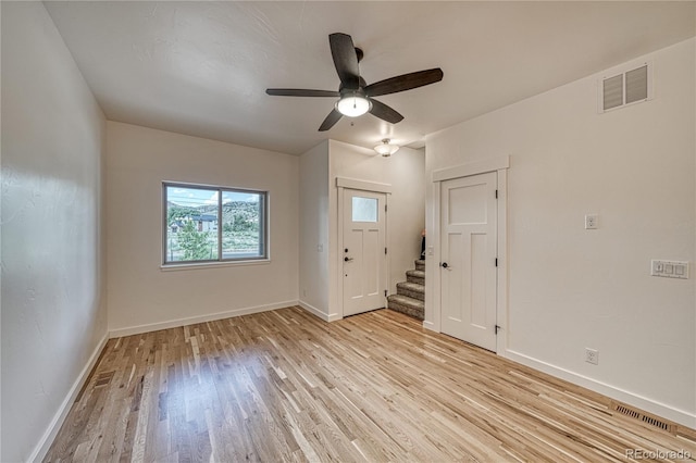 unfurnished room featuring ceiling fan and light hardwood / wood-style flooring