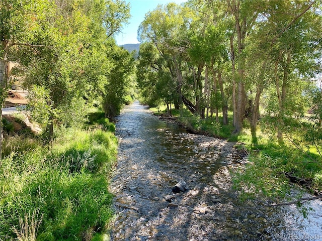 view of street with a water view