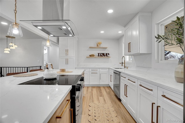 kitchen featuring electric range oven, light stone countertops, white cabinetry, open shelves, and a sink