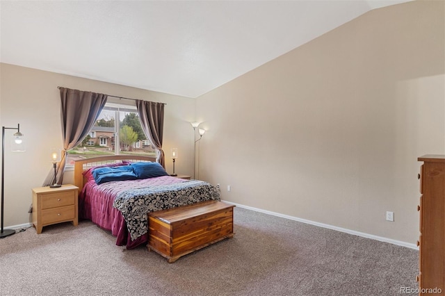 5220 Topaz Dr, Colorado Springs, CO 80918 - bedroom featuring lofted ceiling, light colored carpet, and baseboards