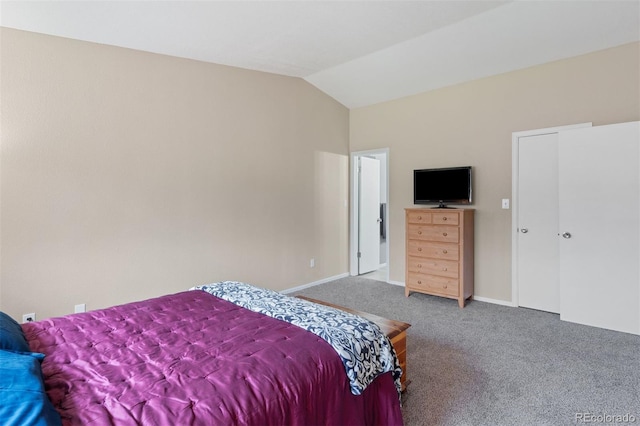 5220 Topaz Dr, Colorado Springs, CO 80918 - bedroom featuring carpet floors, vaulted ceiling, and baseboards
