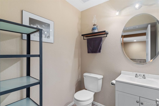 5220 Topaz Dr, Colorado Springs, CO 80918 - half bath featuring toilet and vanity