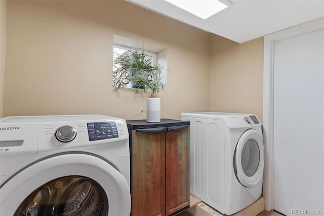 5220 Topaz Dr, Colorado Springs, CO 80918 - washroom featuring cabinet space and washing machine and dryer