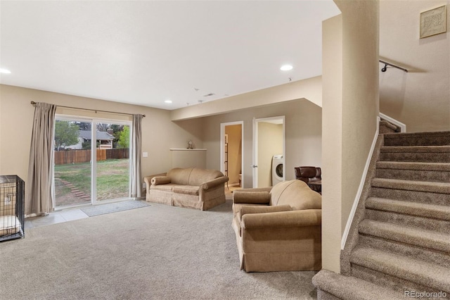 5220 Topaz Dr, Colorado Springs, CO 80918 - carpeted living area with washer / dryer, stairway, and recessed lighting