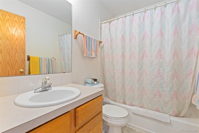 7209 W 21st St, Greeley, CO 80634 - full bathroom featuring shower / bath combination with curtain, vanity, and toilet