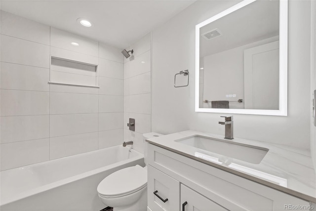 714 Sedge Way, Lafayette, CO 80026 - bathroom featuring vanity, toilet, tub / shower combination, and recessed lighting