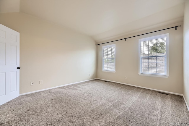 2902 W Long Cir Unit B, Littleton, CO 80120 - unfurnished room with lofted ceiling, carpet flooring, and baseboards