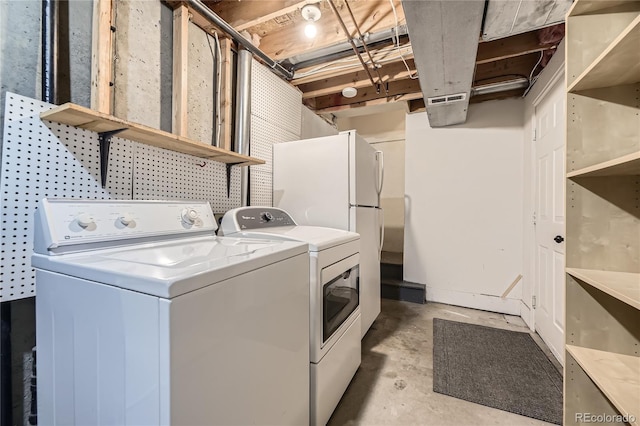 2902 W Long Cir Unit B, Littleton, CO 80120 - laundry area featuring washer and clothes dryer