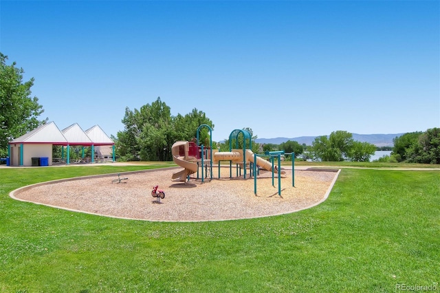 2902 W Long Cir Unit B, Littleton, CO 80120 - community jungle gym featuring a lawn and a mountain view