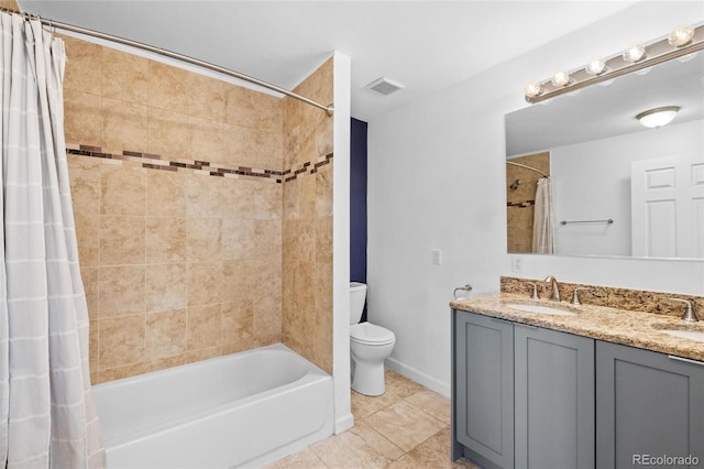 full bathroom with toilet, vanity, tile patterned flooring, and shower / tub combo with curtain