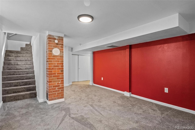 basement with carpet flooring