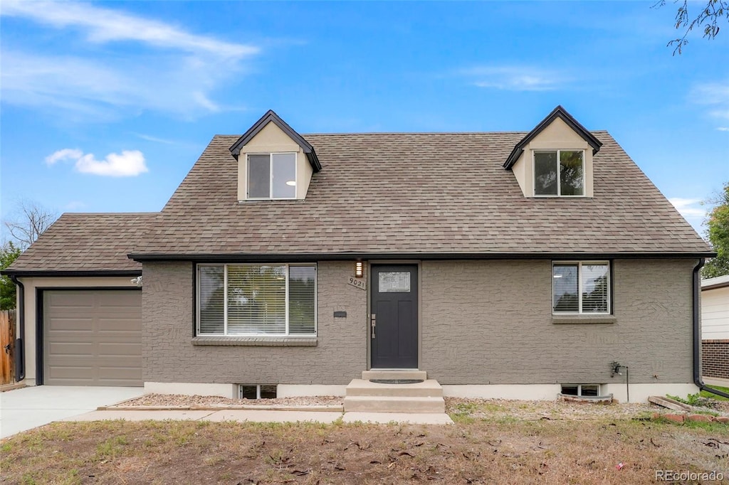 view of front of property featuring a garage