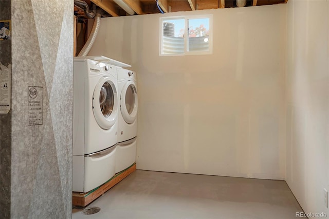 washroom featuring washer and dryer