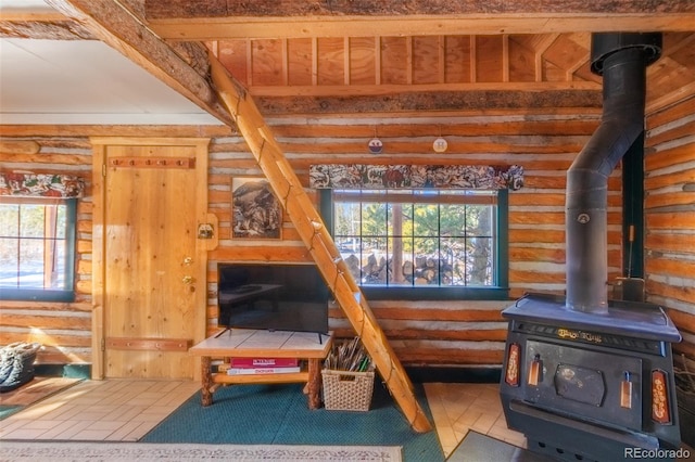 interior space featuring a wood stove